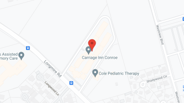 Carriage Inn Conroe in google map